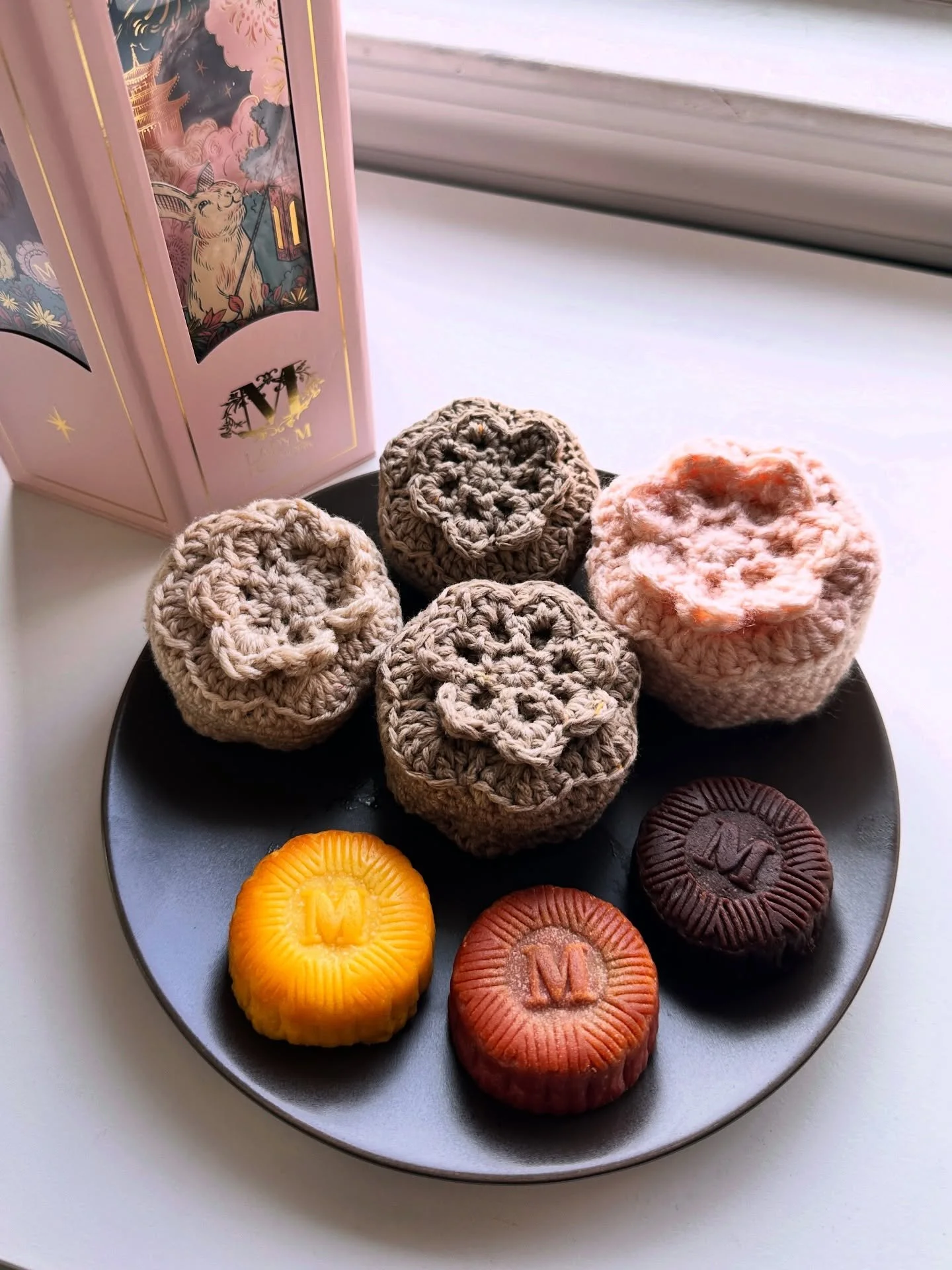 中秋節快樂🌙🏮🥮 I usually can&rsquo;t eat enough mooncake to justify buying a traditional box at the Chinese grocery store so I decided to crochet some mooncakes instead! (Pattern is free by @curiouspapaya on the @cloverusa website). I even made one into