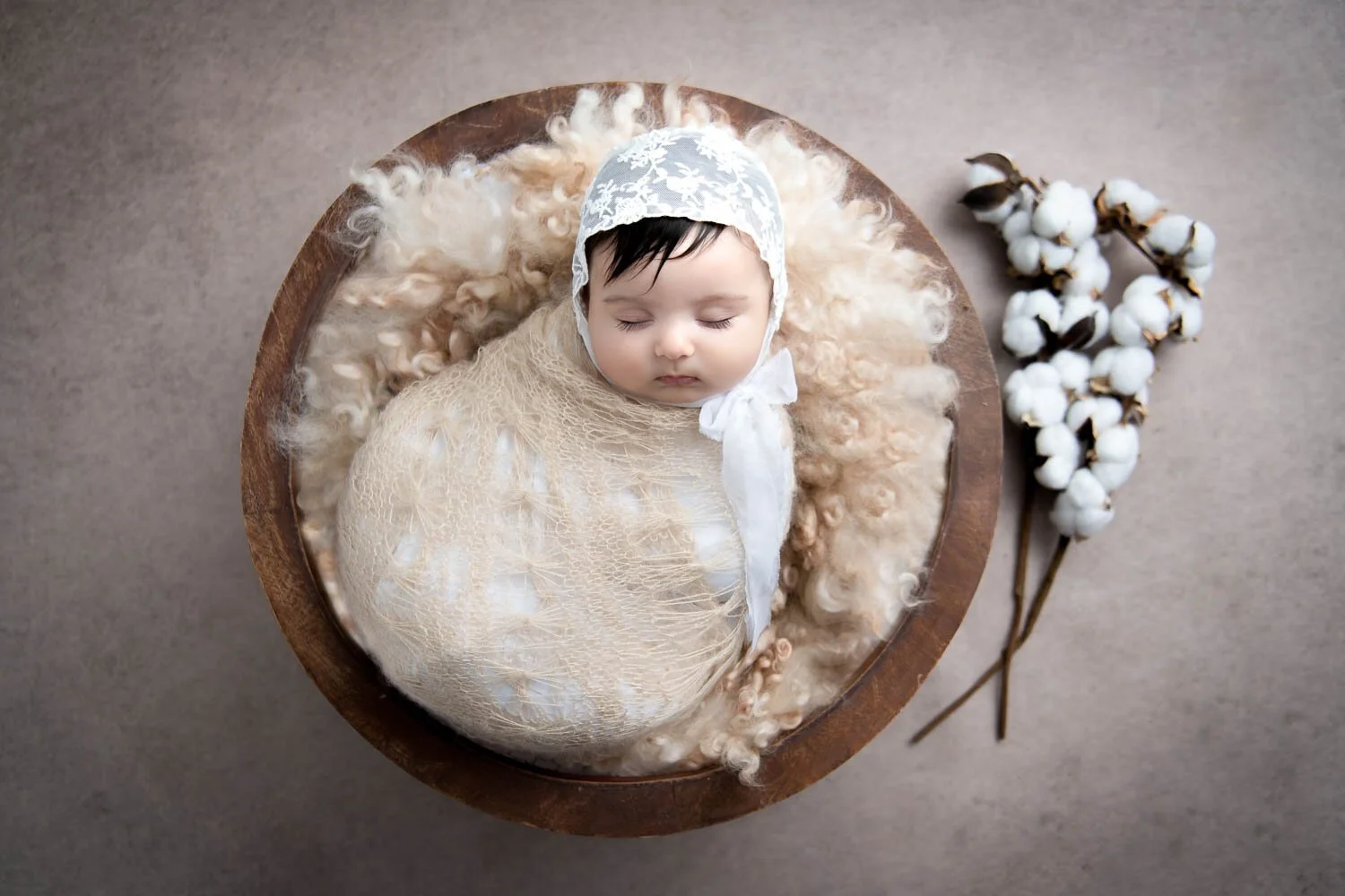 newborn posed in studio setup
