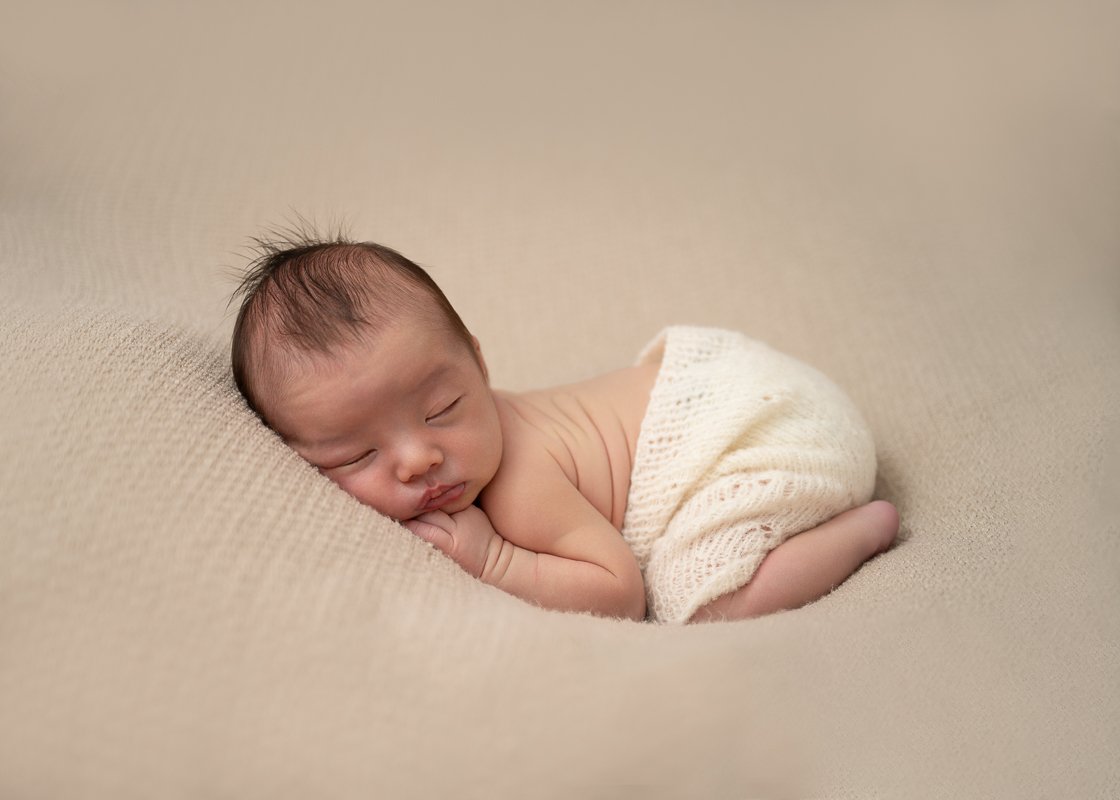 Bayside newborn photographer Newborn photographer Melbourne photo of a Sleeping newborn baby wearing woollen bloomers