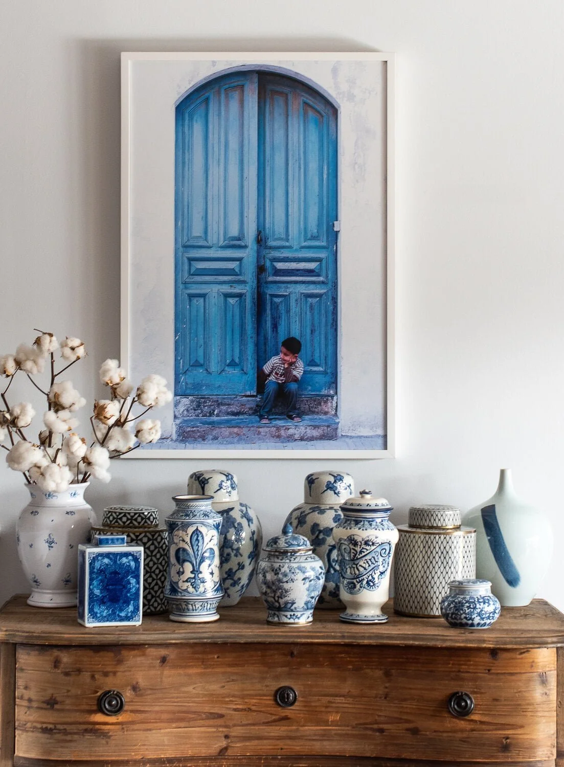 Susan+Bradfield+Photography%2C+boy+sitting+in+front+of+blue+door+in+Morocco_compressed.jpg