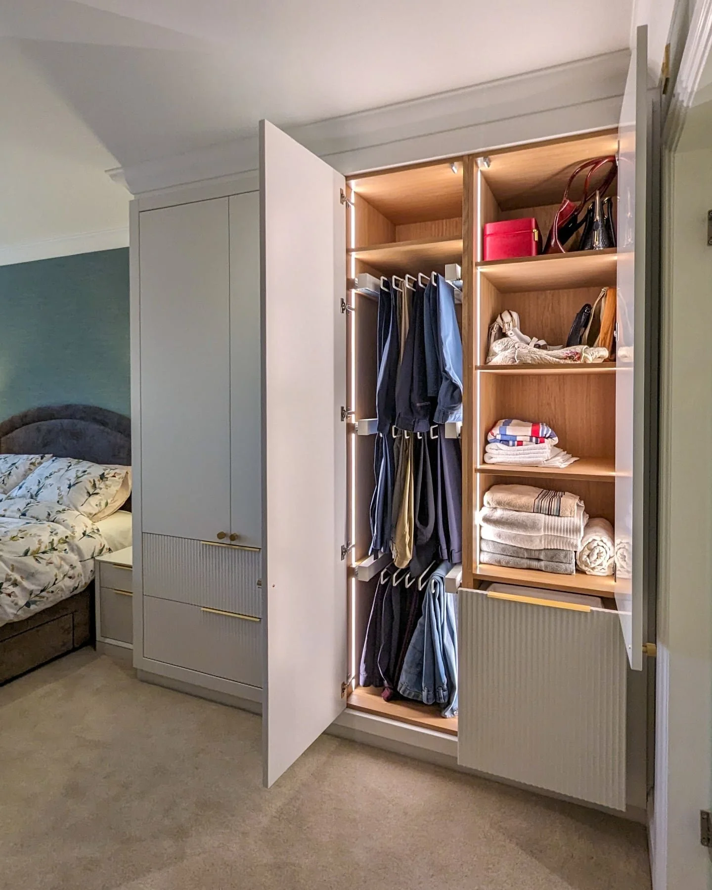 Spray-finished doors, fluted drawer fronts, vertical LED lighting and oak veneer carcasses.

Classic detailing paired with clean contemporary lines - timeless, high-end joinery designed to elevate everyday spaces.

Designed, made and installed by Y+D