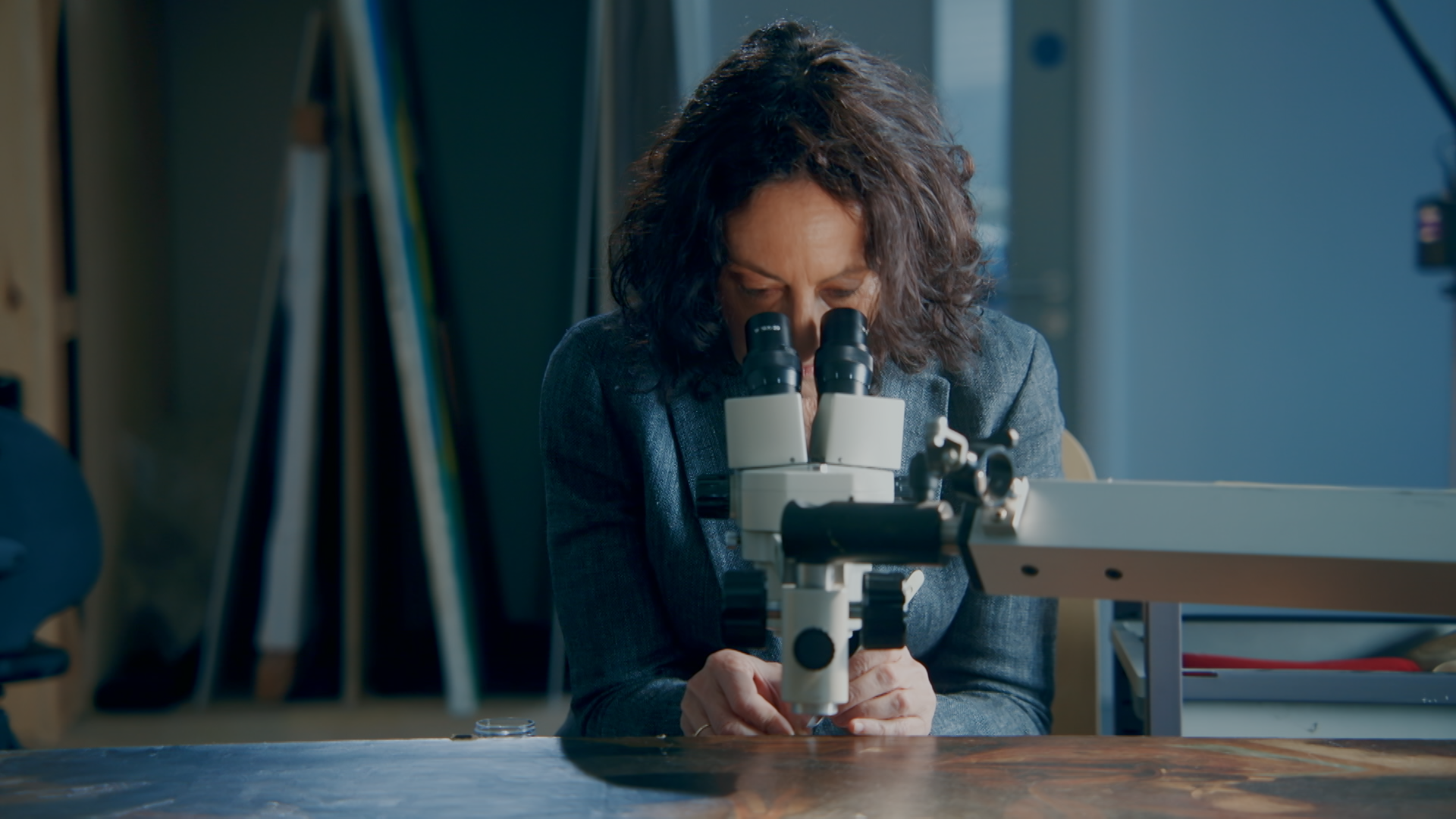 Woman with microscope.png
