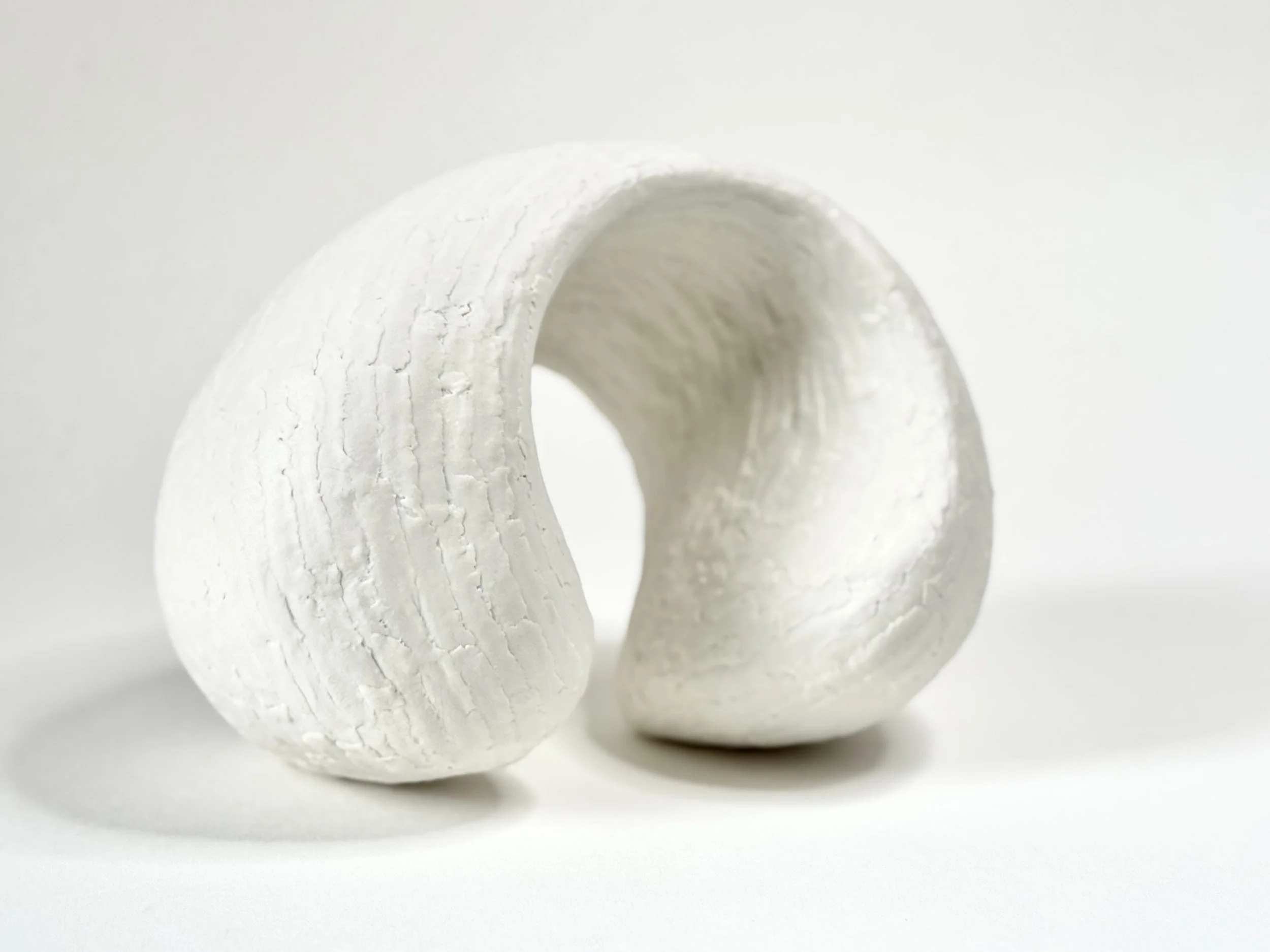 Paper porcelain sculpture with Porcelain de Limoges, color white.