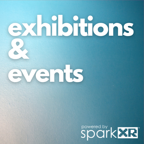 Sign reading 'exhibitions & events' with the logo 'powered by sparkXR' on a blue background.