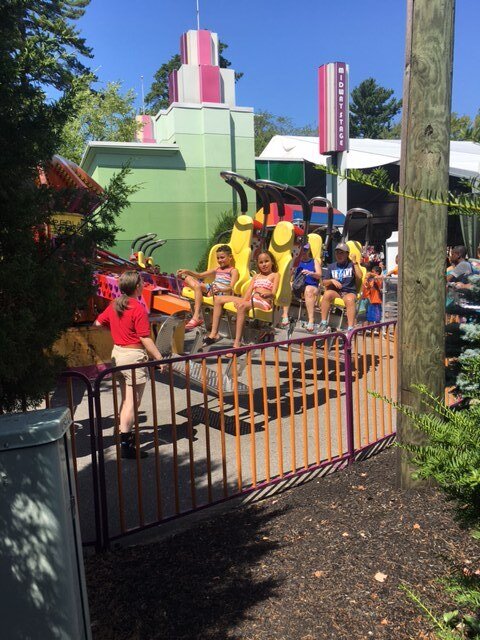 Two siblings, Hara and Jean, enjoy a roller coaster together