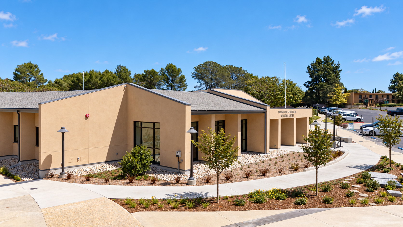 Warm campus facade beneath blue skies.png
