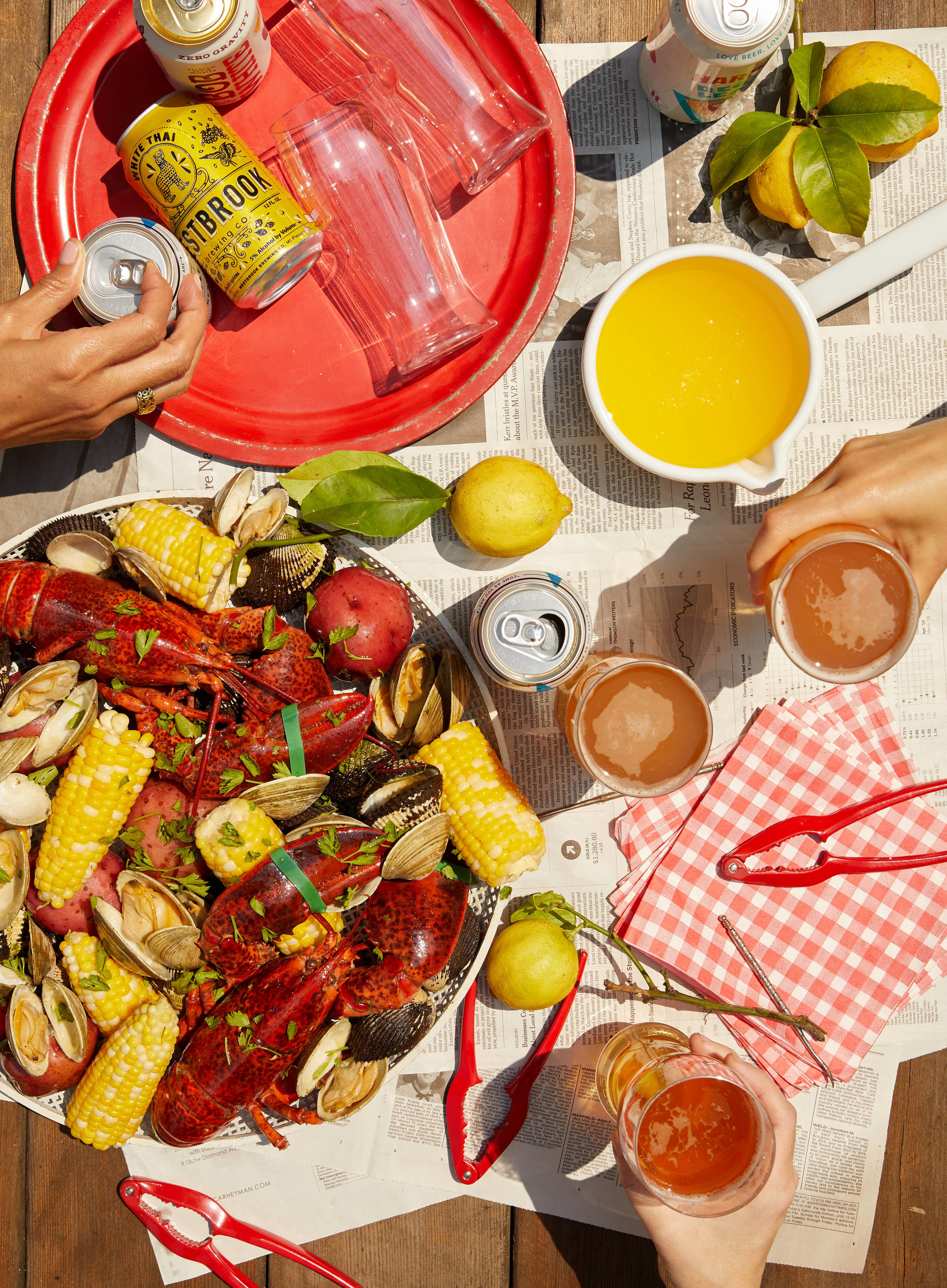 kate sears editorial nyc art director govino unbreakable beer glass lobster corn bake lemons summer butter red tray napkins picnic table lunch maine