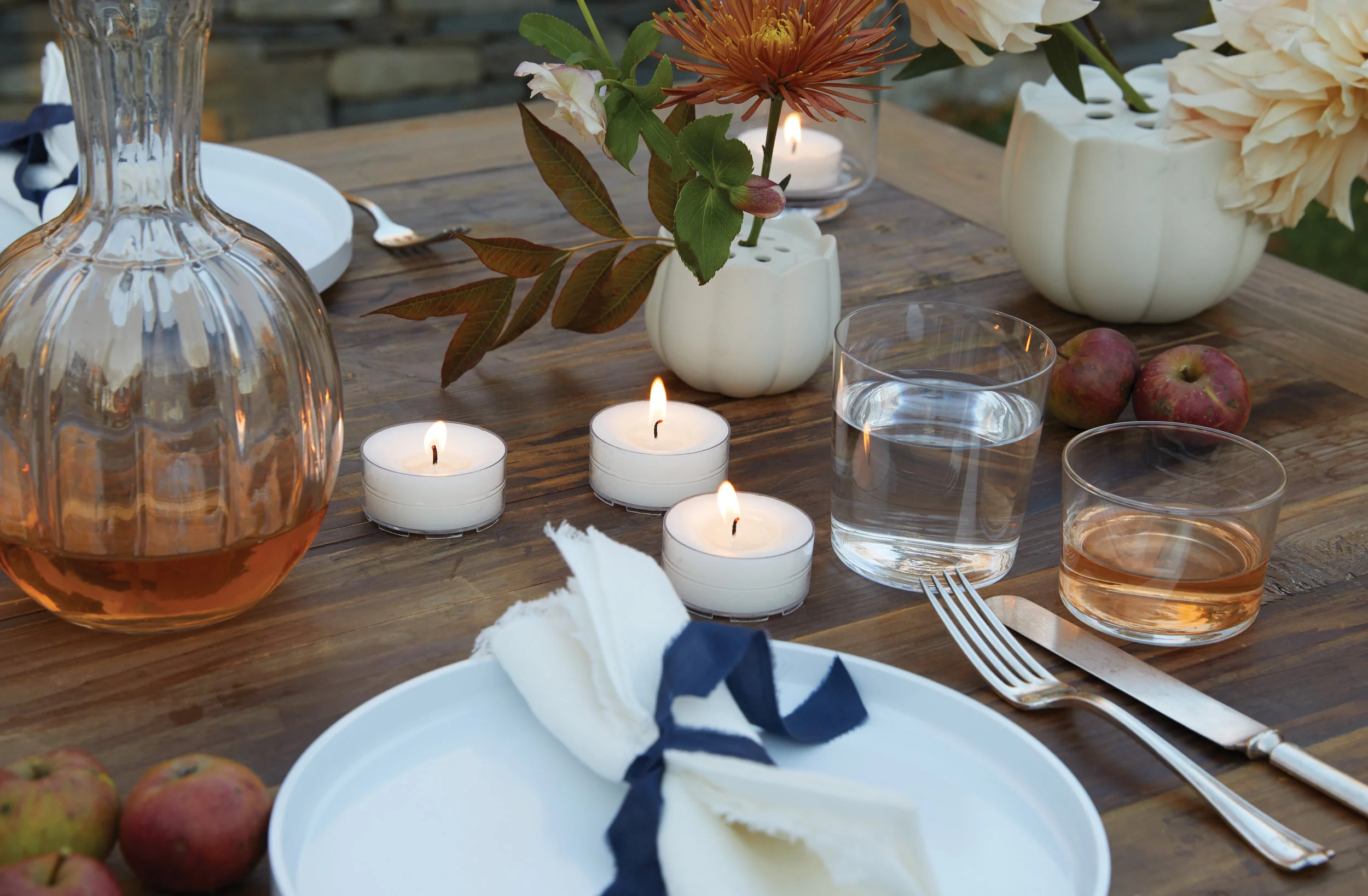 kate sears sierra steifman nyc art director photographer lifestyle editorial the floral society outdoor event table tea light candle flower frog wedding place setting