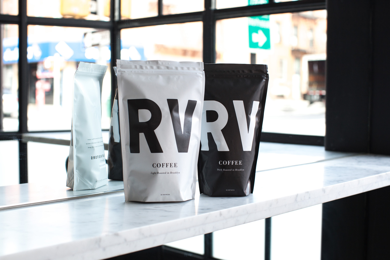 aesthetic movement graphic designer nyc regular visitors design branding logo boerum hill brooklyn retail packaging design black white typography RV coffee private label windows marble gift morning