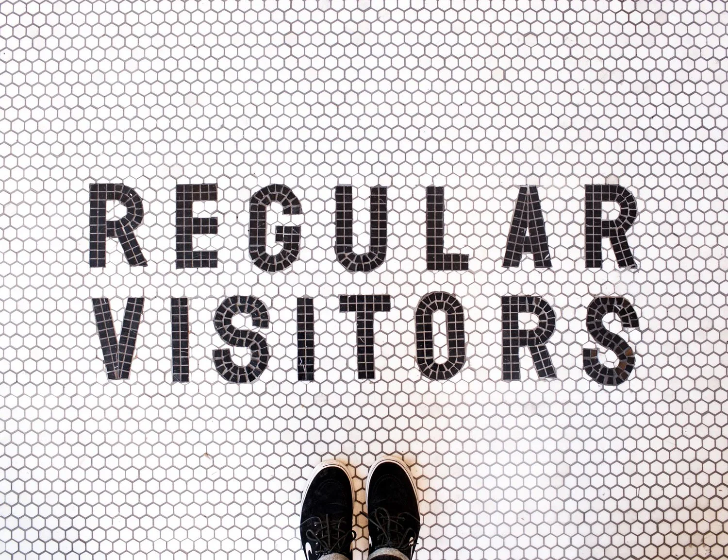 aesthetic movement graphic designer nyc regular visitors logo design penny tile floor letters vintage sneakers black white boerum hill brooklyn new york retail 