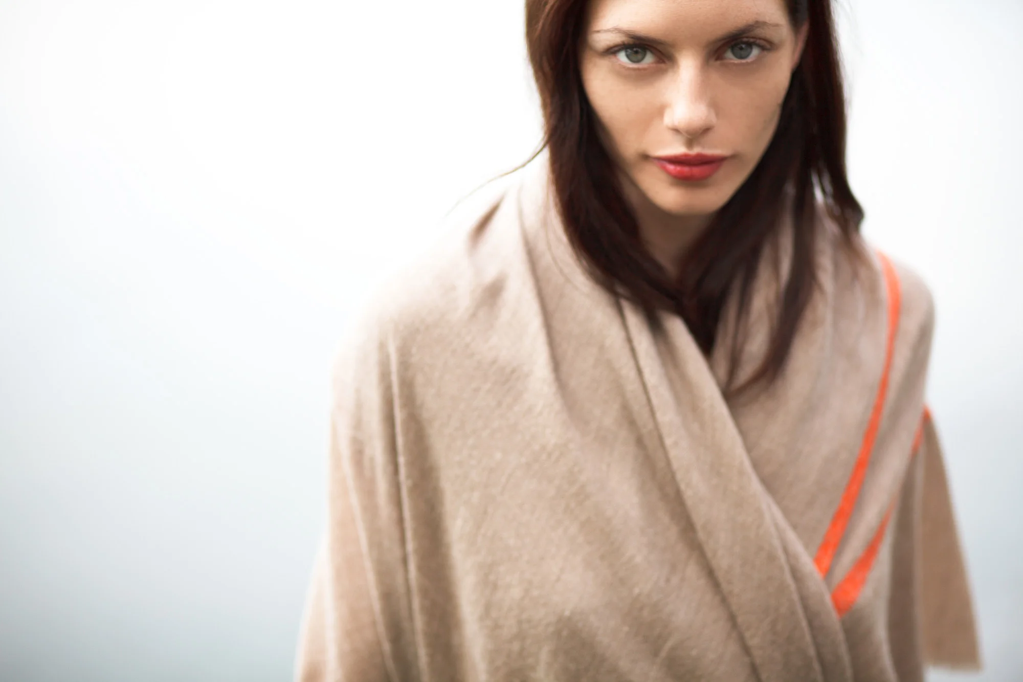 andraab catalog design photo shoot nyc art director accessories apparel shawls scarves scarf brunette model orange detail