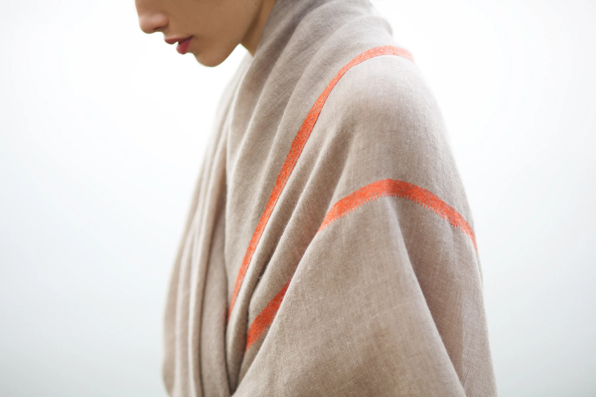 nyc art director accessories apparel andraab catalog design photo shoot shawls scarves scarf orange detail natural water