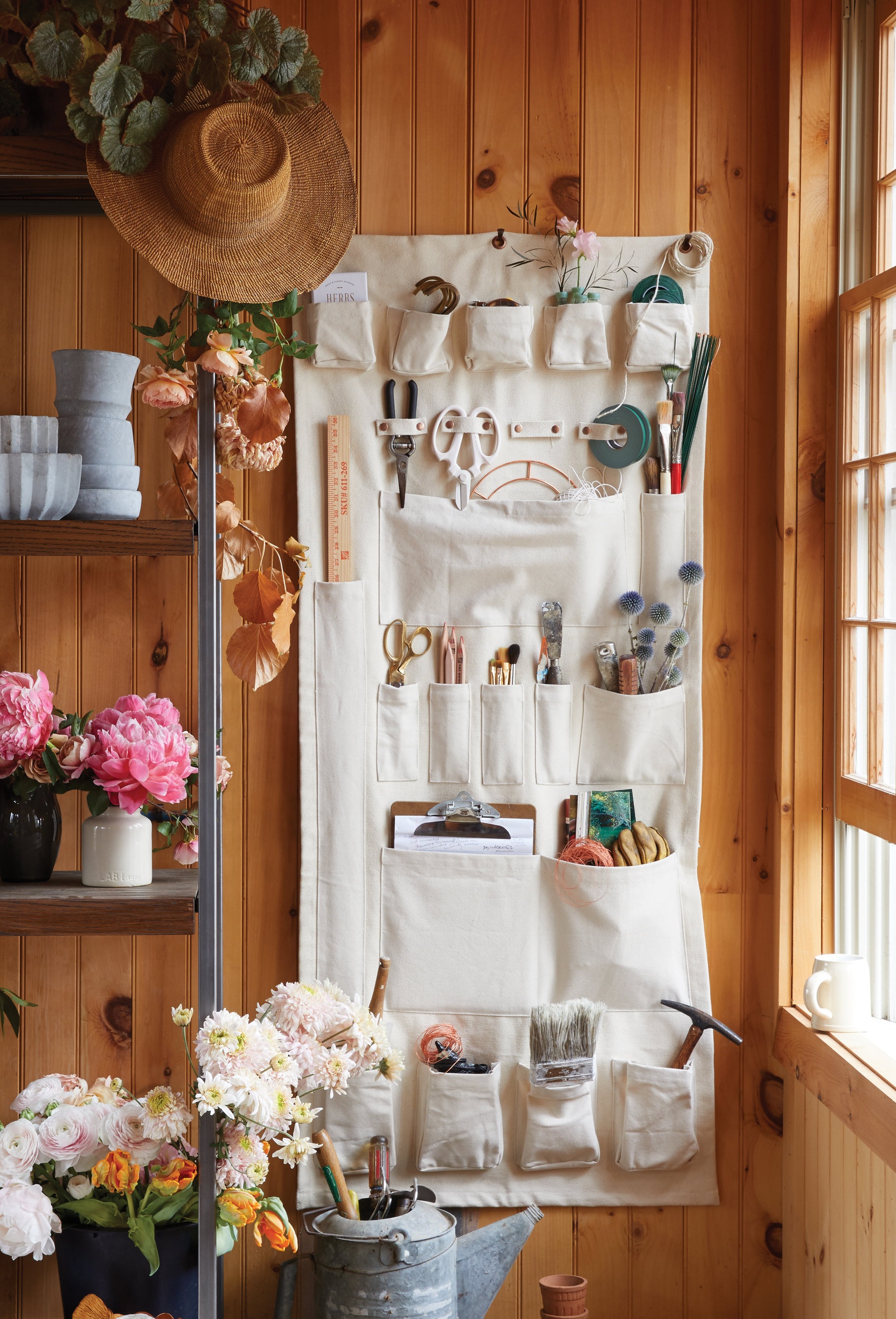 kate sears sierra steifman nyc art director photographer lifestyle editorial the floral society product design canvas wall organizer organization tools workshop wood paneling flowers craft 