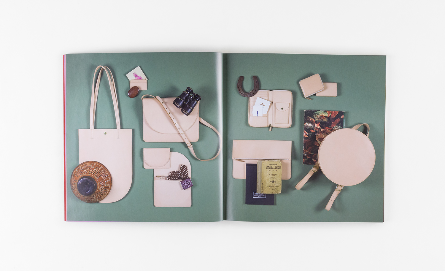 nyc graphic designer art director MH minor history leather goods product accessories design editorial catalog nude natural handbags tote bag travel binoculars sage green horseshoe carryon west