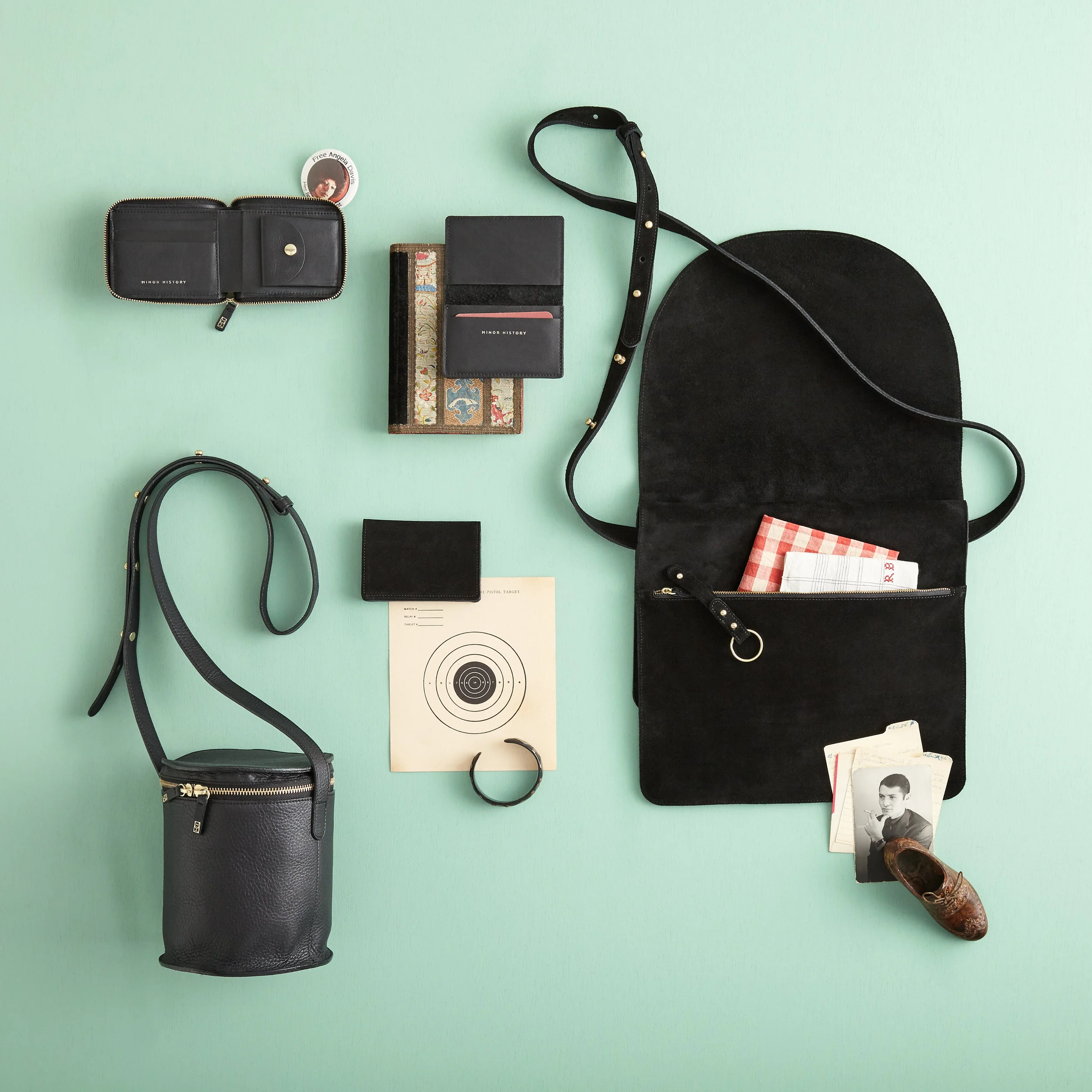 nyc graphic designer art director MH minor history leather goods product accessories design editorial black drum saddle pouch wallet mint green vintage ephemera crossbody music travel birthday college