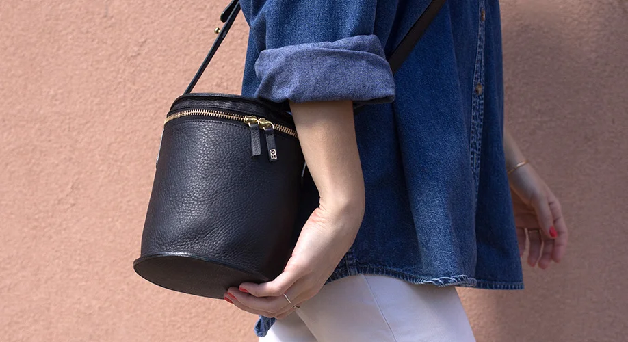 nyc graphic designer art director MH minor history leather goods product accessories design editorial denim black drum crossbody white pants pink peach coral wall texture city life