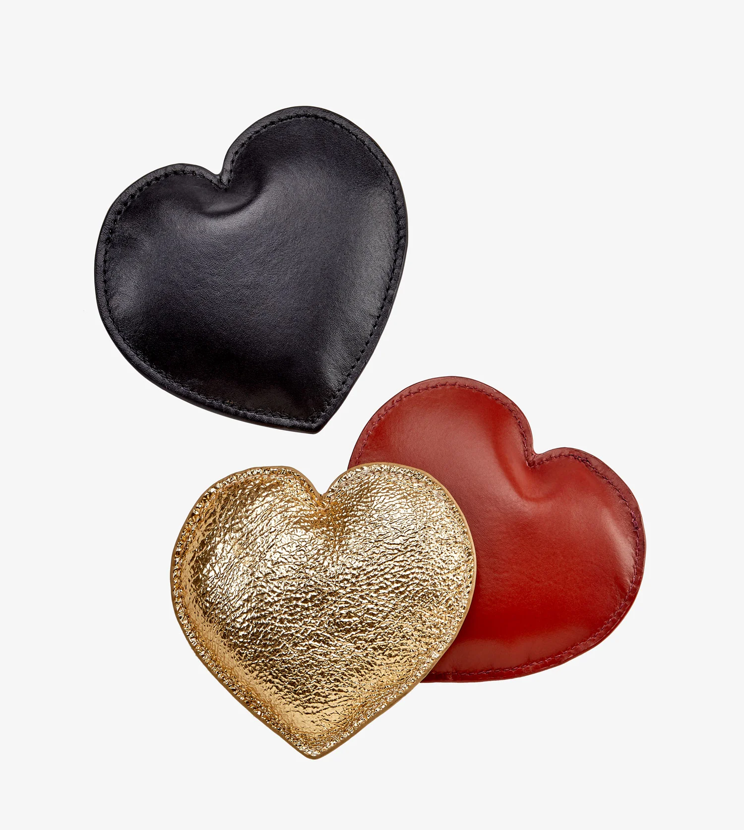 nyc designer graphic image x A/M Aesthetic Movement New York leather paperweights heart black red gold