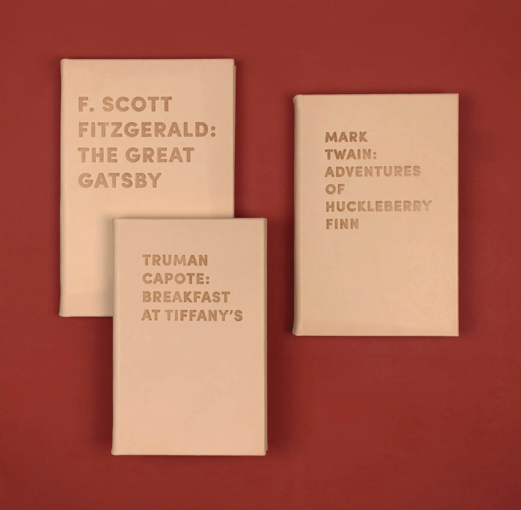 nyc designer graphic image x A/M Aesthetic Movement New York leather recovered books nude f. scott fitzgerald the great gatsby capote breakfast tiffany's twain huckleberry finn