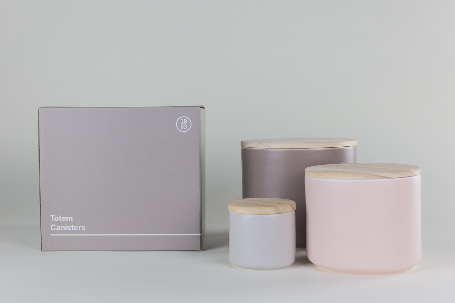 nyc art director dining kitchen graphic designer1993 willie tsang ceramics colored product design tabletop collection canisters wood lid packaging gray box totem