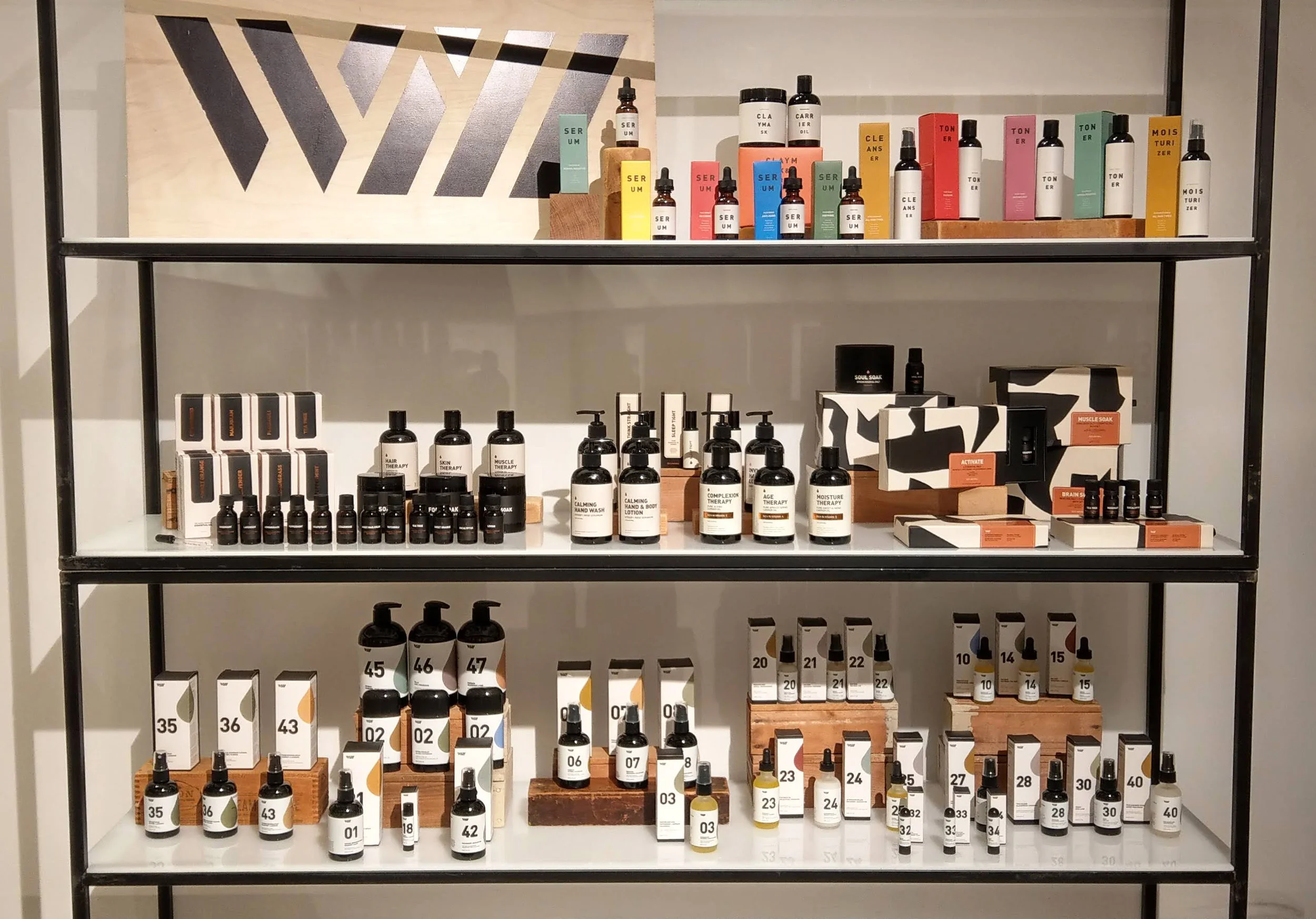 nyc graphic designer skincare beauty way of will essential oils willie tsang body care wellness packaging black white design copper trade show shoppe object home gift