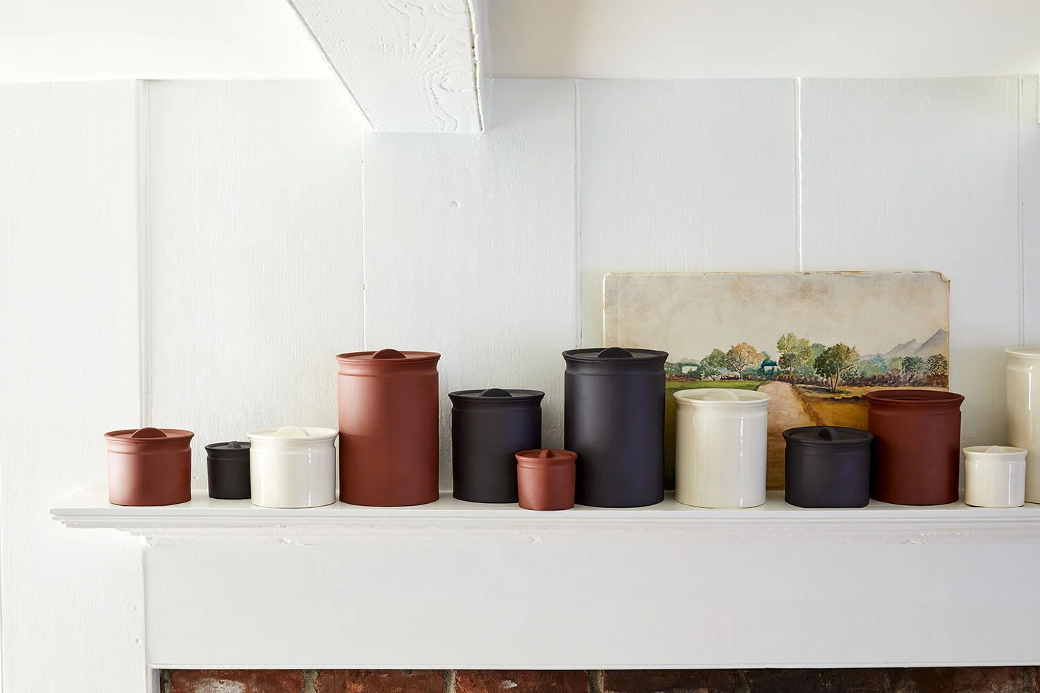 styling shelfie gift home kate sears aesthetic movement art director sir/madam ceramic canisters mantle white wood black matte terra cotta white glass product design