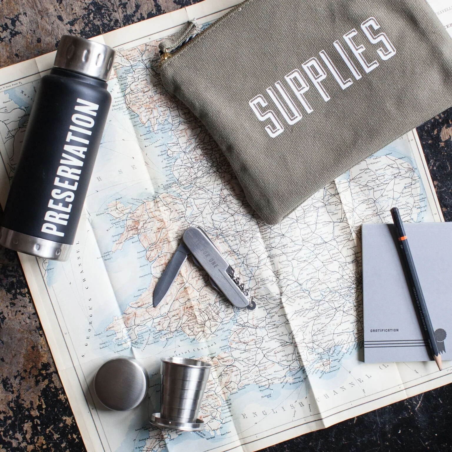 nyc graphic designer home gift izola design water bottle zip pouch preservation black supplies green army pocket knife collapsible travel cup notebook pencil map adventure