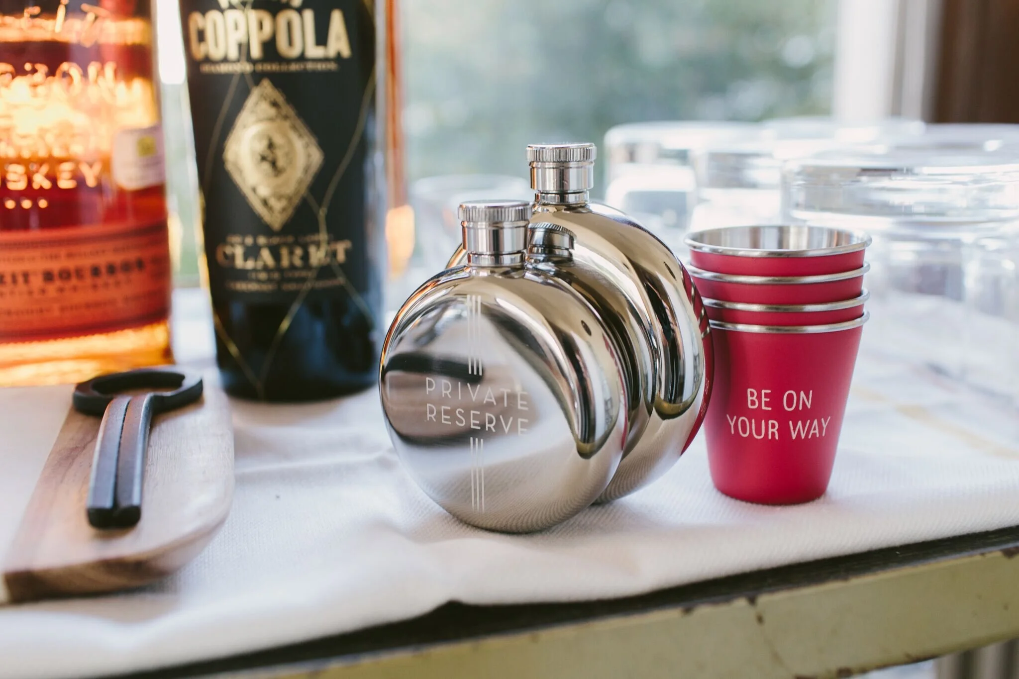 nyc graphic designer home gift liquor drinking bachelor party izola design private reserve stainless steel round flask shot glass painted coppola whiskey bar entertain gift