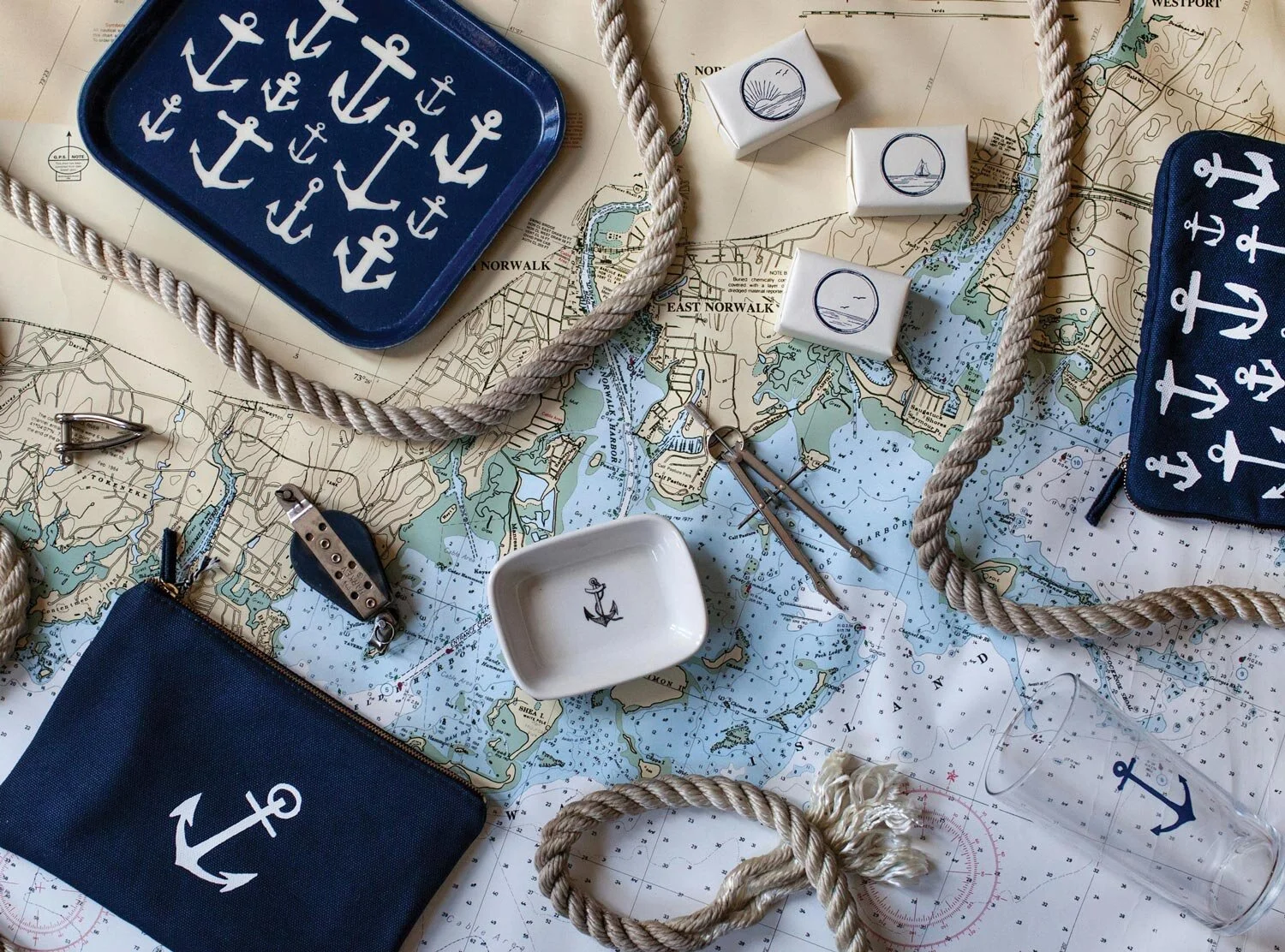 izola design trays pouch maritime anchors blue indigo sea ocean travel soap dish rope circle window porthole packaging nyc graphic designer home gift 