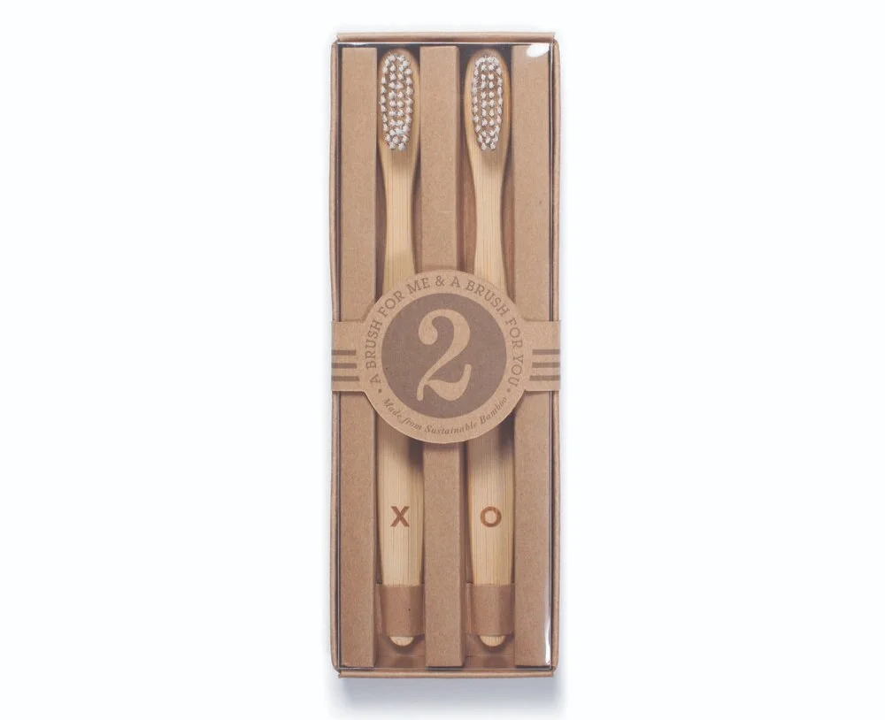 nyc graphic designer home gift izola design packaging kraft sustainable recycle bamboo toothbrush pair two 2 brush me you X O XO stripe beauty care