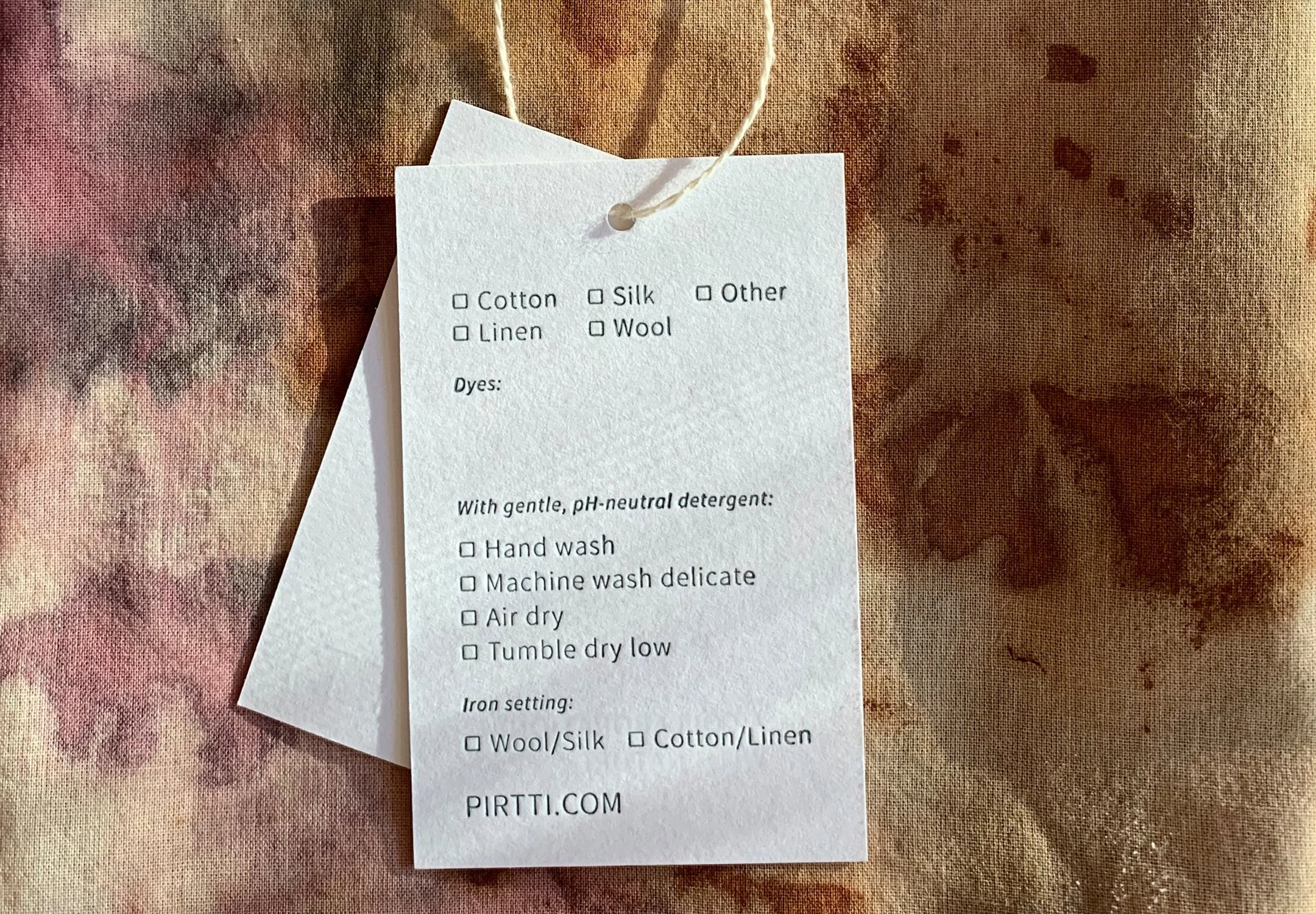 pirtti_tag_back.jpg