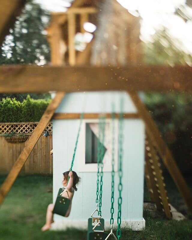 She will fight you for the best swing, so be prepared for a screaming match from the 20 month old 😆 #summervibes☀️ #scenesfrommybackyard #playhouse #playset #lensbabyedge35 #lensbabyathome #lensbabycomposerpro #lensbabychallenge