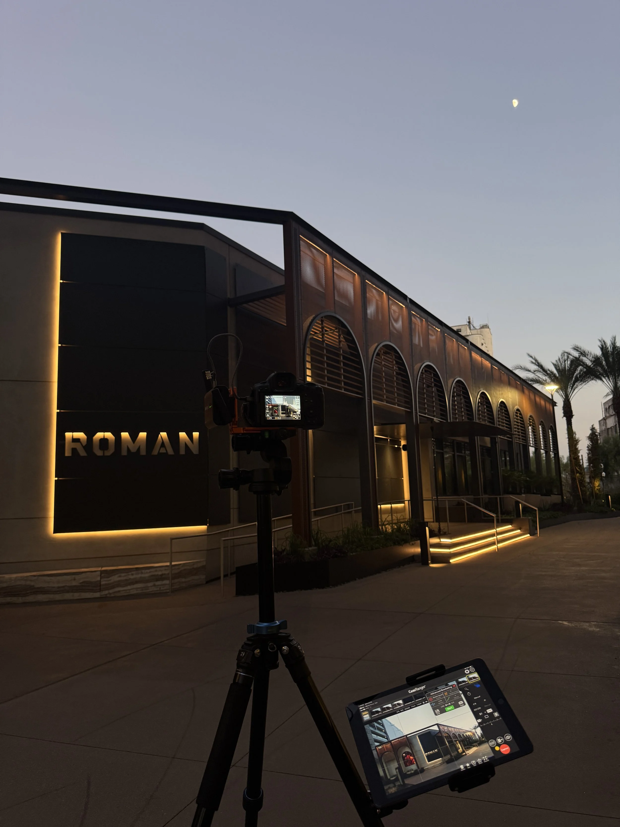 Tripod setup for a twilight architectural photography shoot in Phoenix