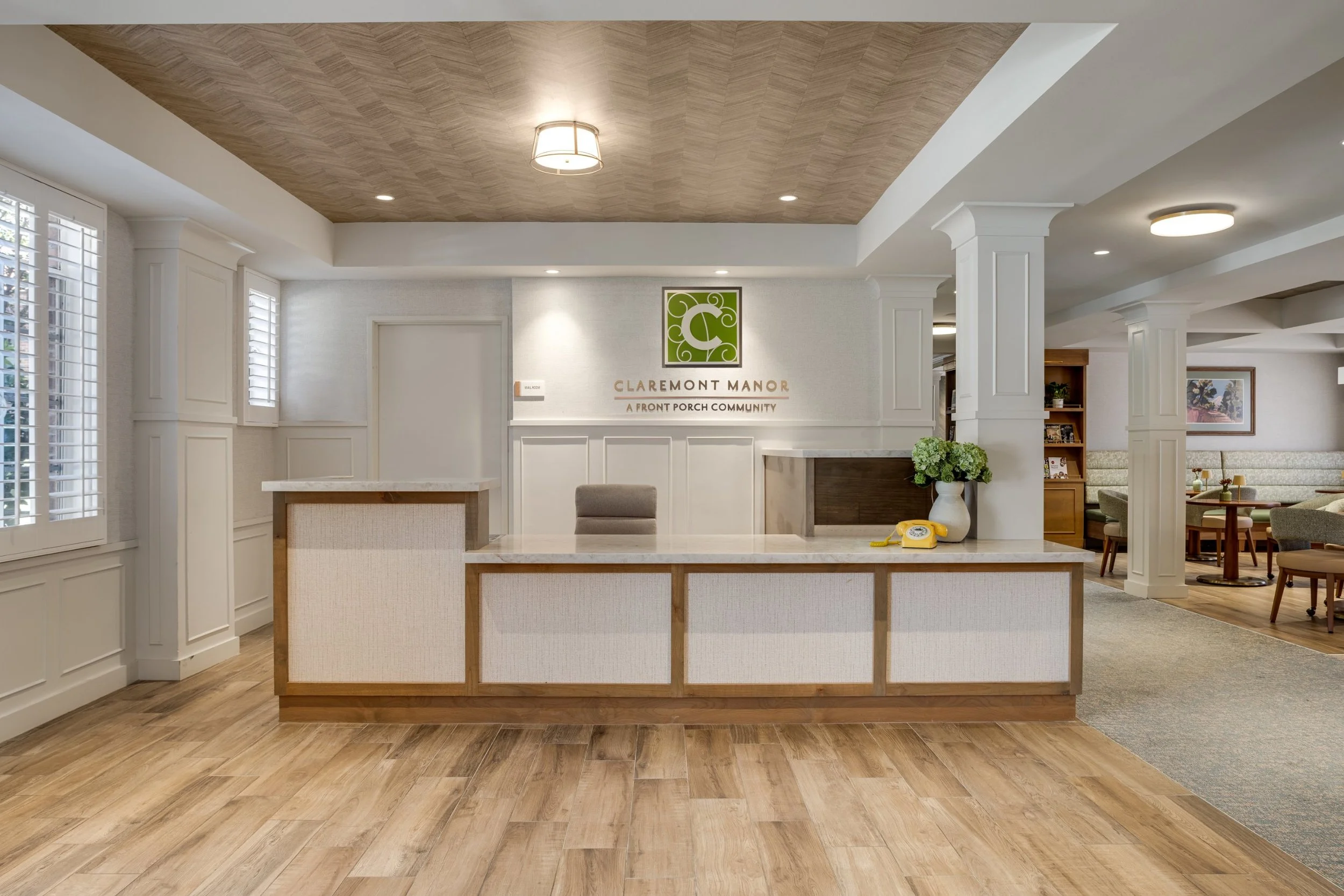 Front desk at Claremont Manor senior living community in Claremont, California, photographed by a Los Angeles interior photographer