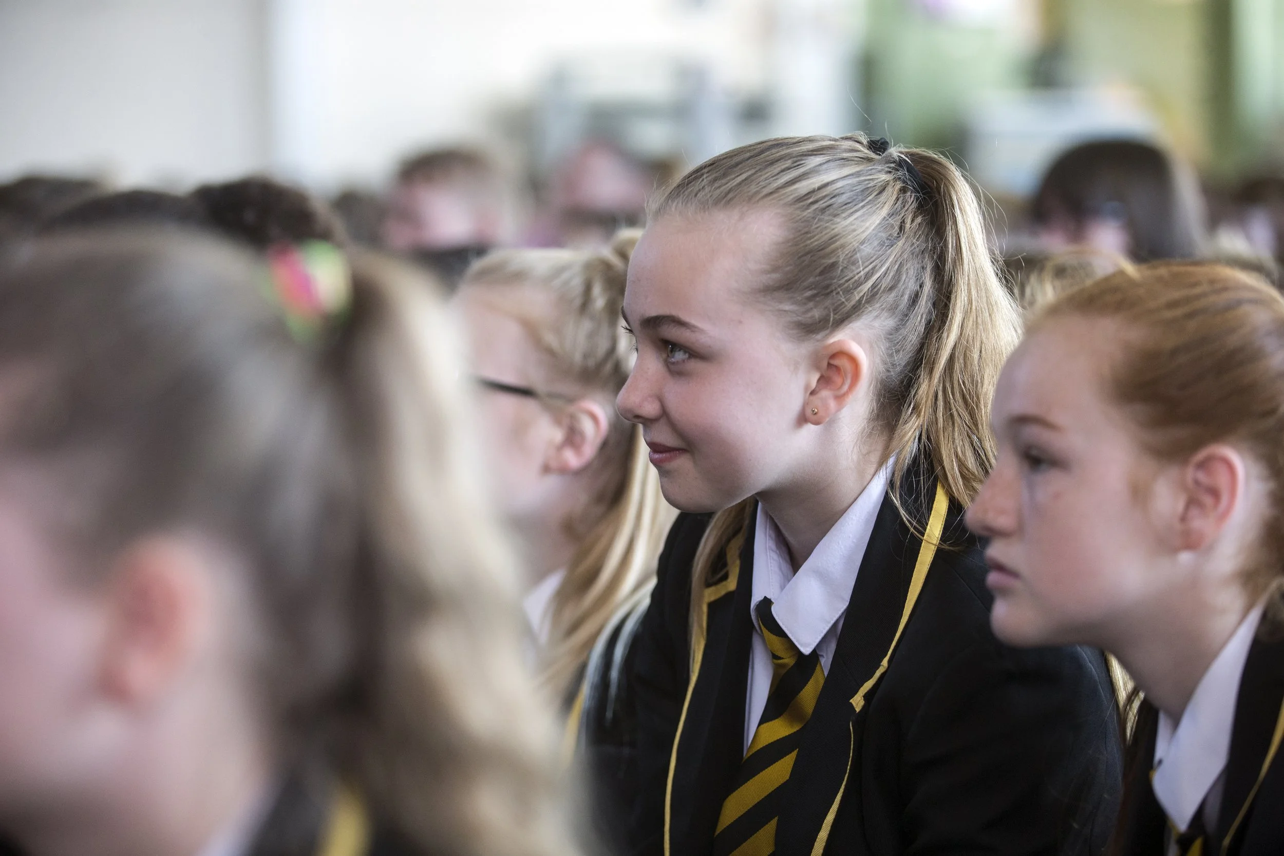 Year 7 students taking part in a road safety workshop following a live performance.