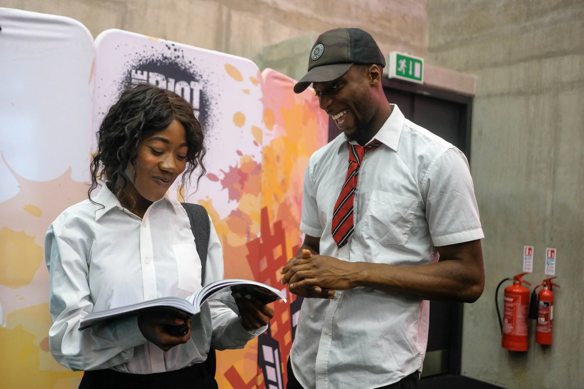 Actors delivering an education programme.