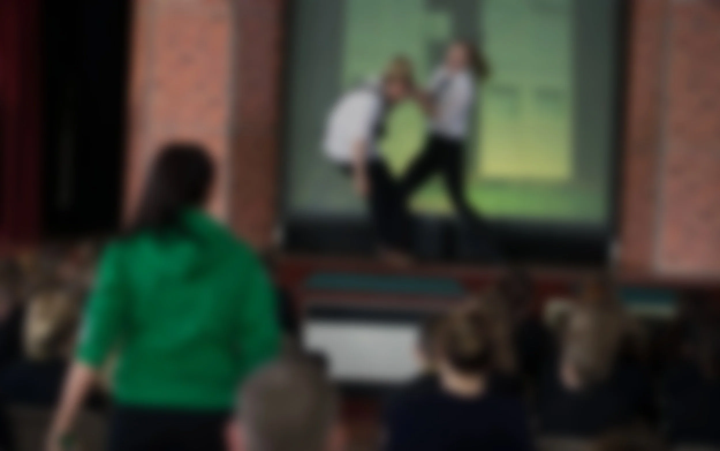 Actors delivering a road safety education programme for secondary school students.