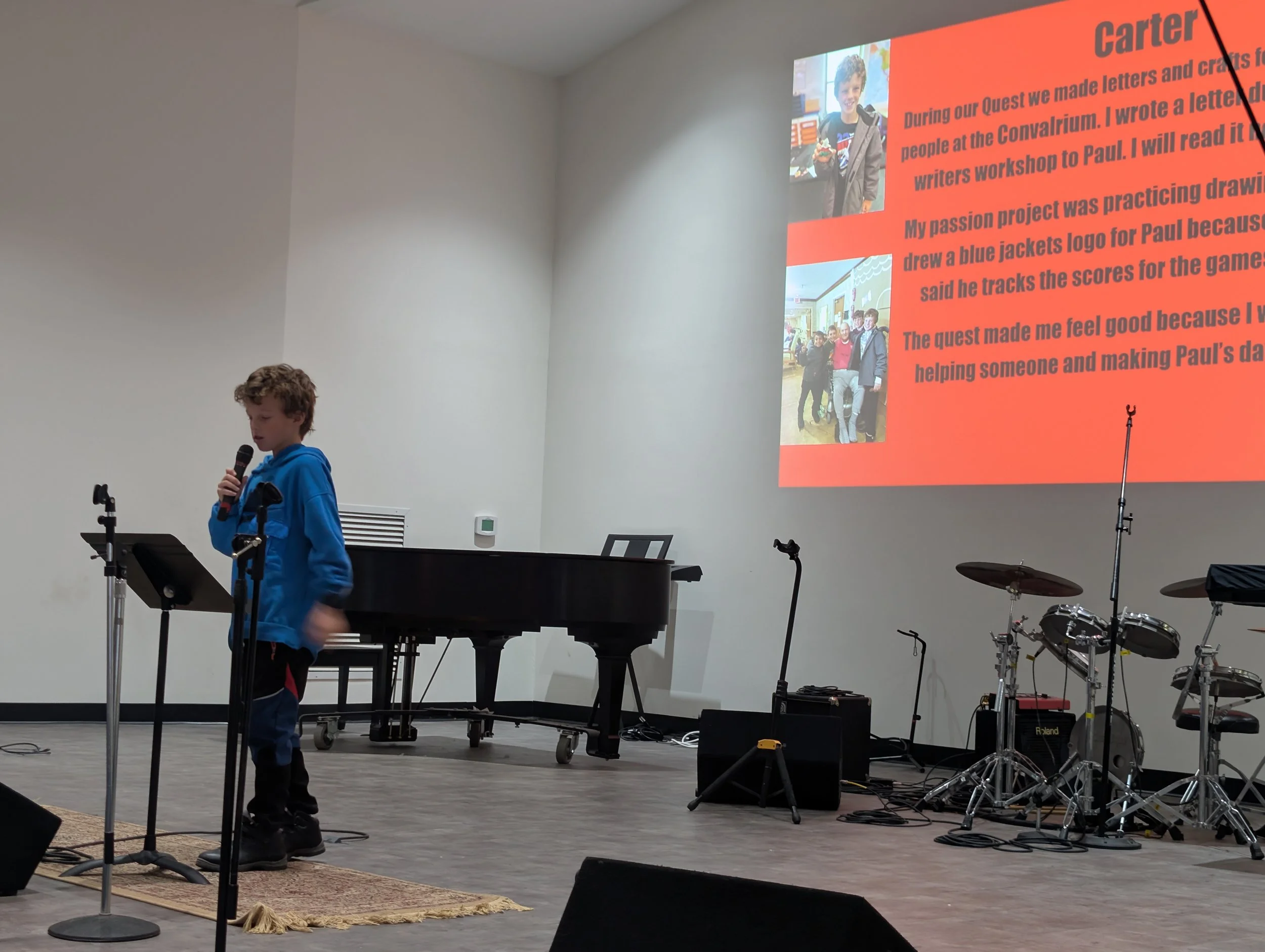 Acton Academy learner presenting at exhibition