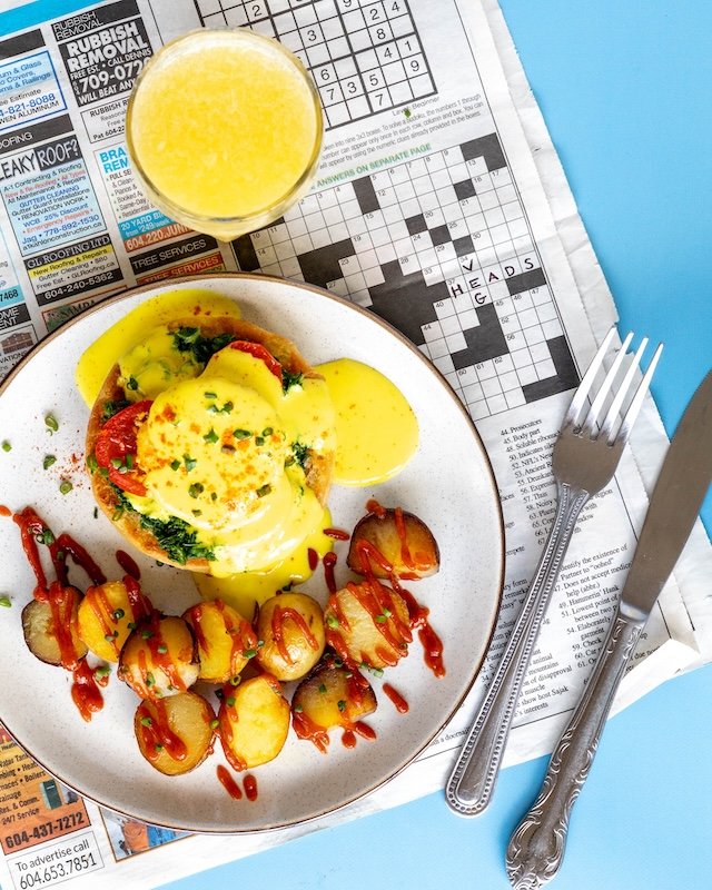 Vegheads vegan Hollanidase sauce benny with newspaper background