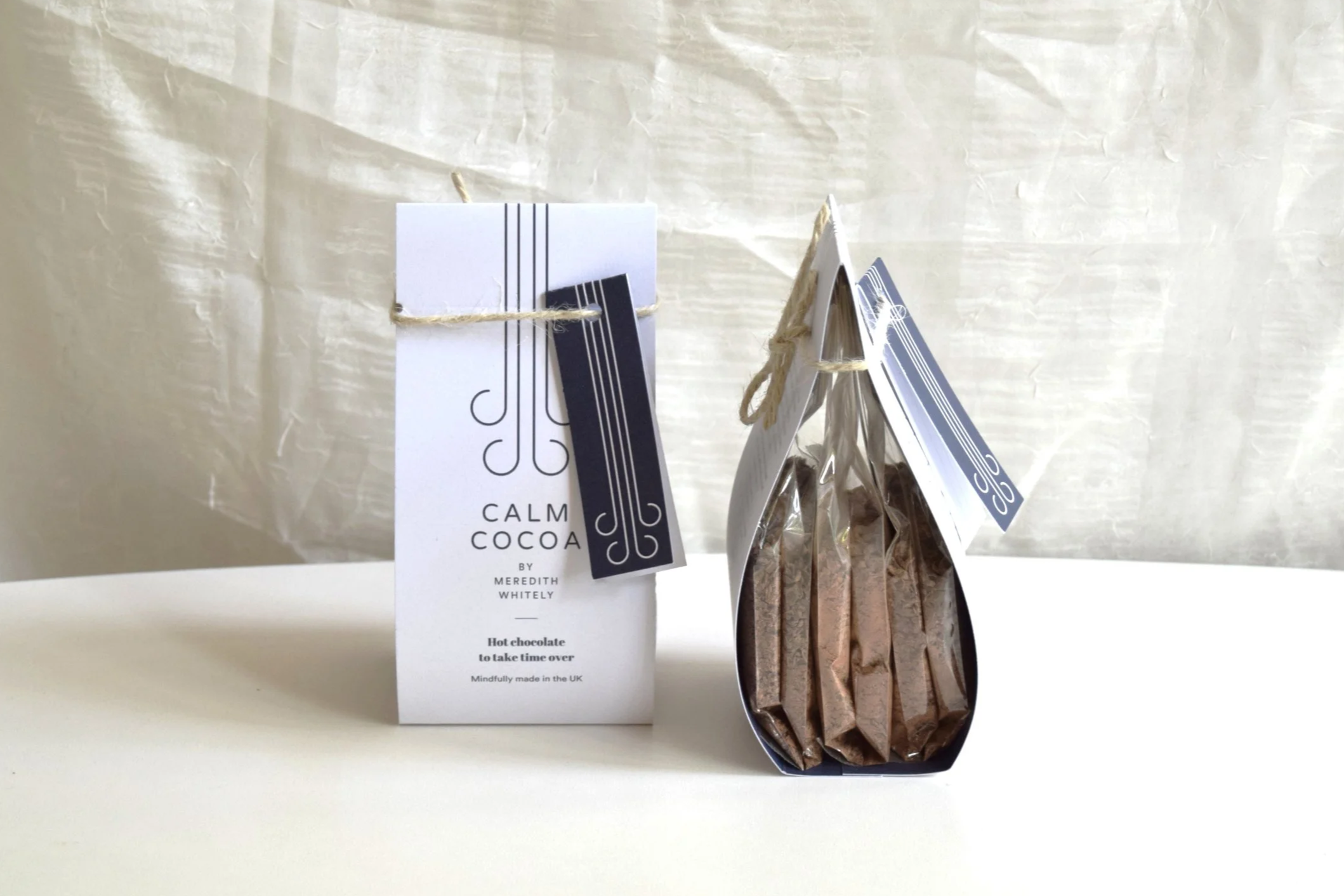 Calm Cocoa six flavour collection of vegan-friendly hot chocolates. Made with flakes of real chocolate they are designed to sip mindfully.