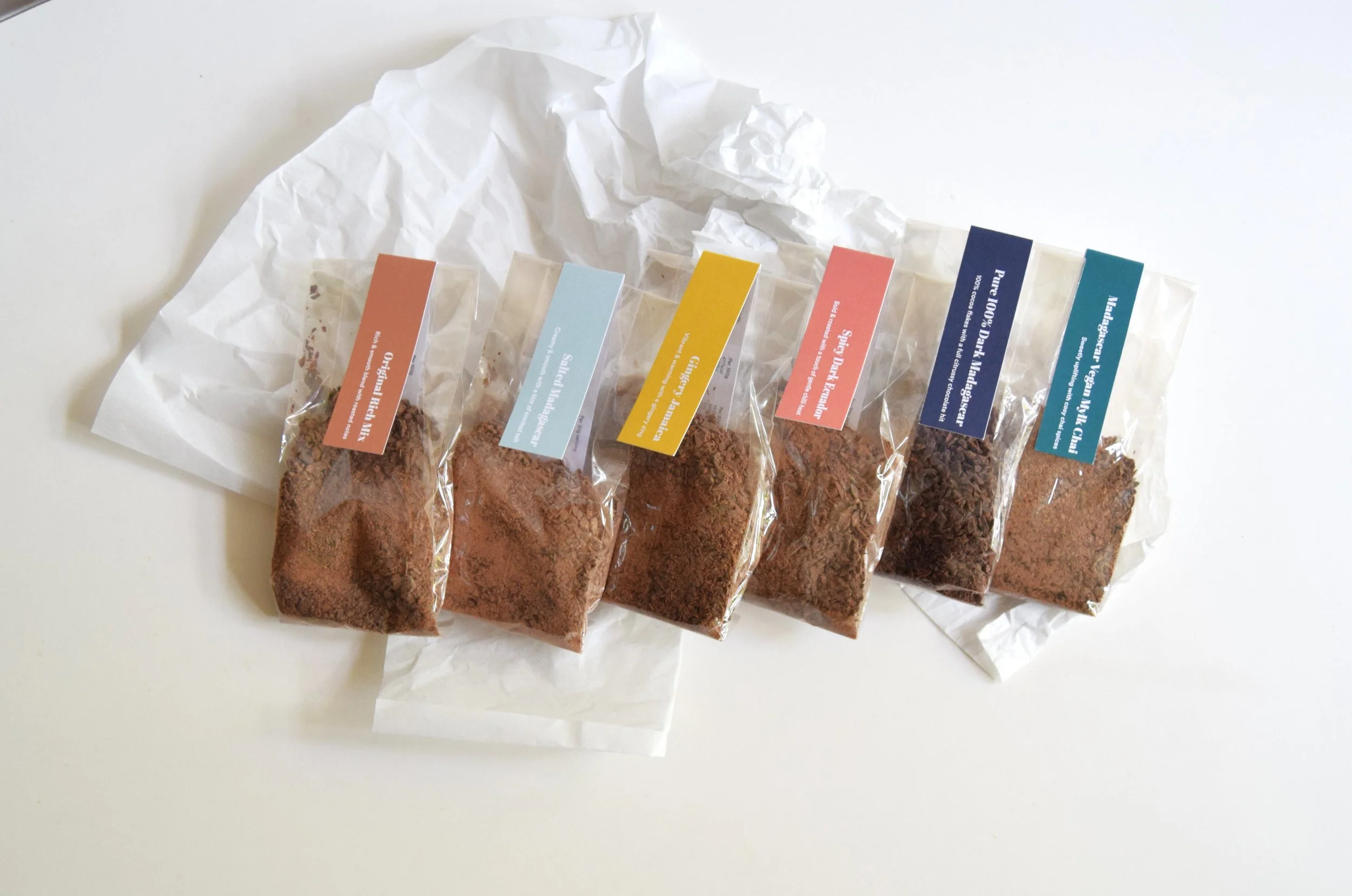 Calm Cocoa six flavour collection of vegan-friendly hot chocolates. Made with flakes of real chocolate they are designed to sip mindfully..