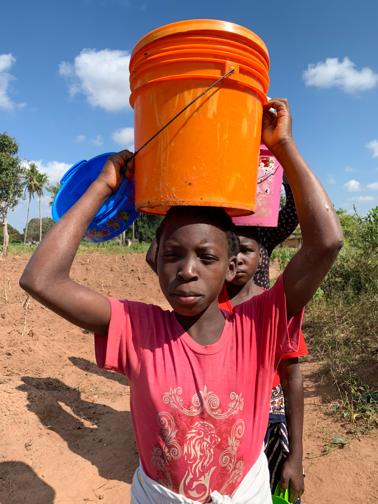 girl pink shirt with bucket on head-39.jpg