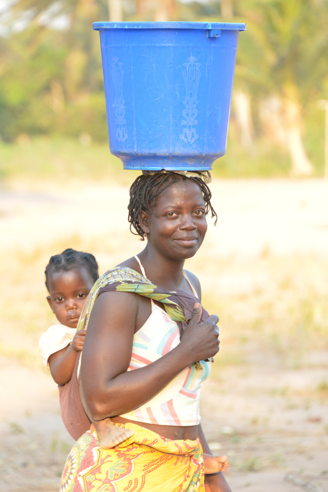 women with baby carring water-.jpg