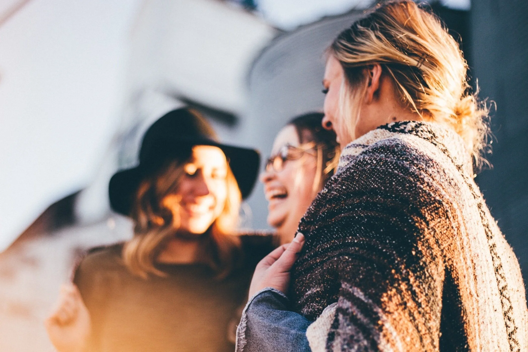 three women laughing