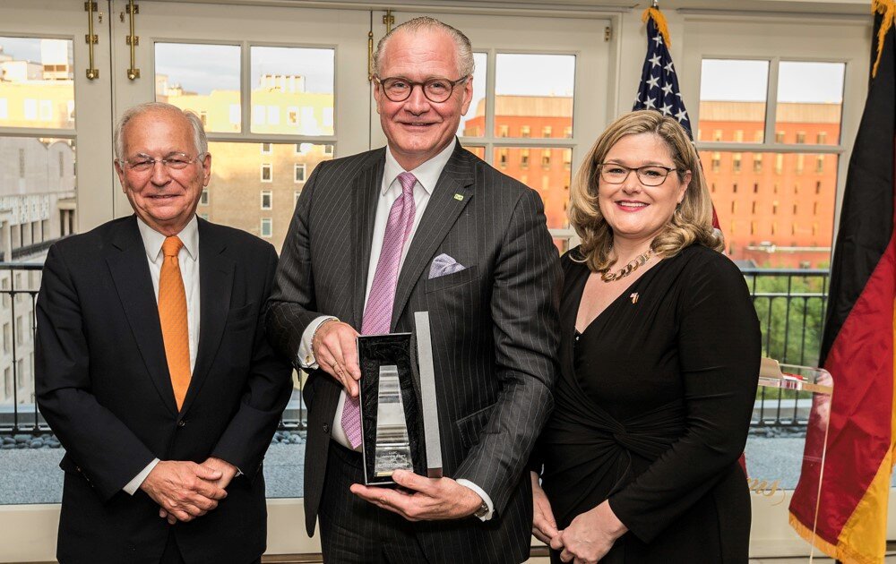  Stefan Oschmann, (Chairman of the Executive Board and CEO of Merck. KGaA), center, accepts the GABC Leadership Award on behalf of Merck KGaA. On left, Wolfgang Ischinger (Munich Security Conference Chair and former German Ambassador to the U.S.); on