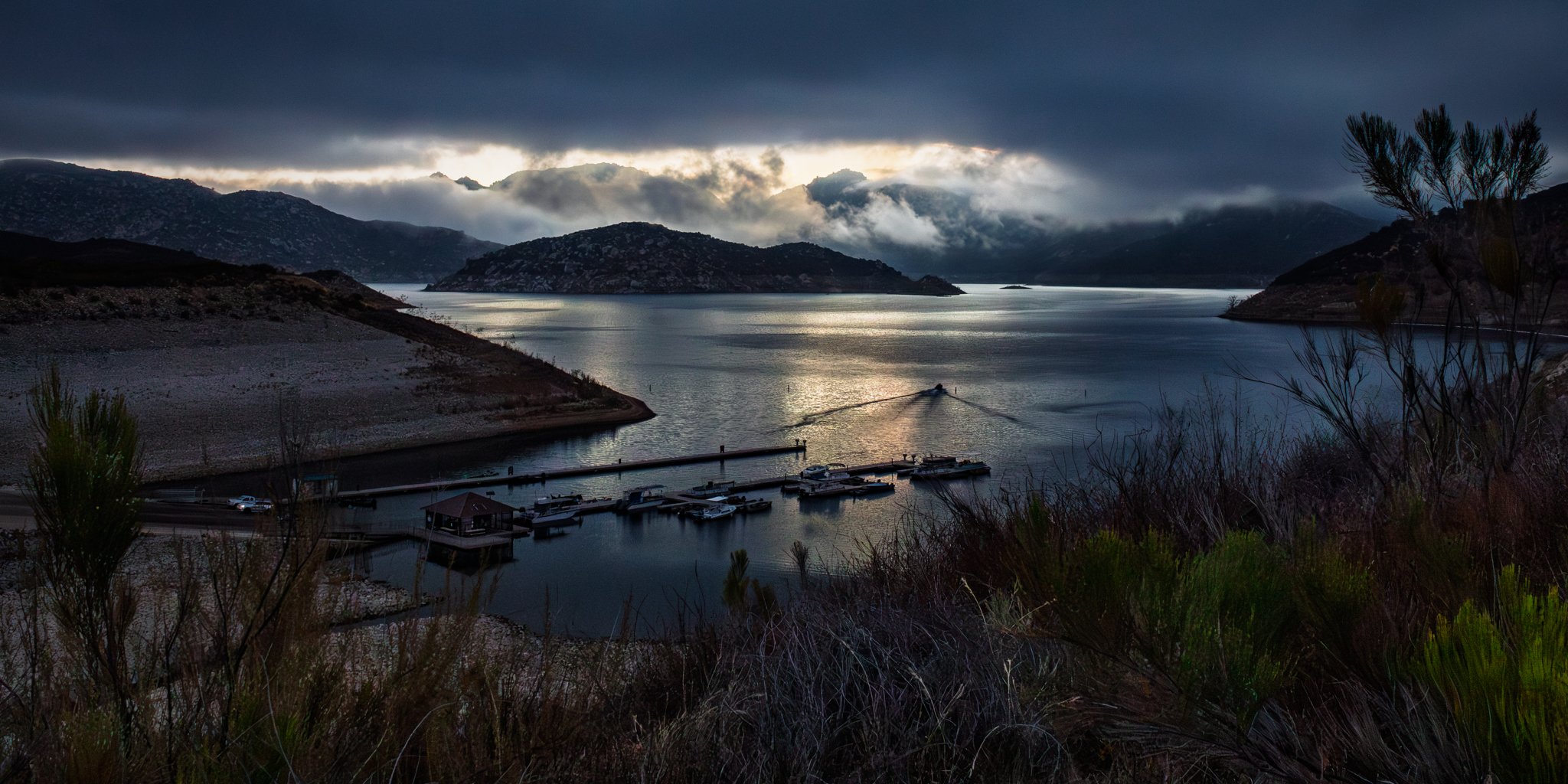 This image was captured at a reservoir close to home for me. I haven't been back there since HS and a few years after for fishing. I no longer fish with a pole, I now use a camera. The idea for this shot was different than what I discovered that day.