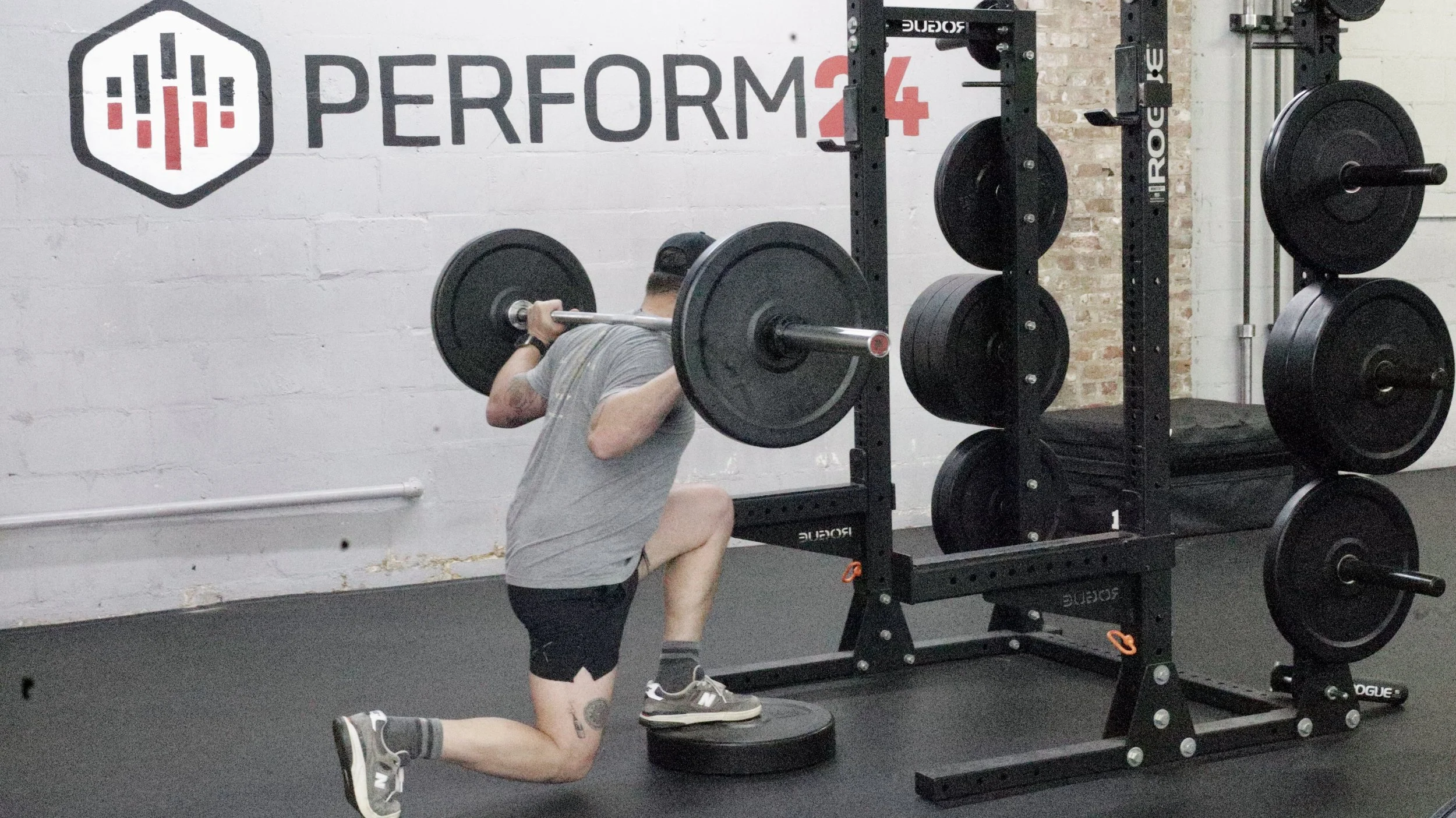 Perform24 members training during a semi-private strength session in Tampa, Florida