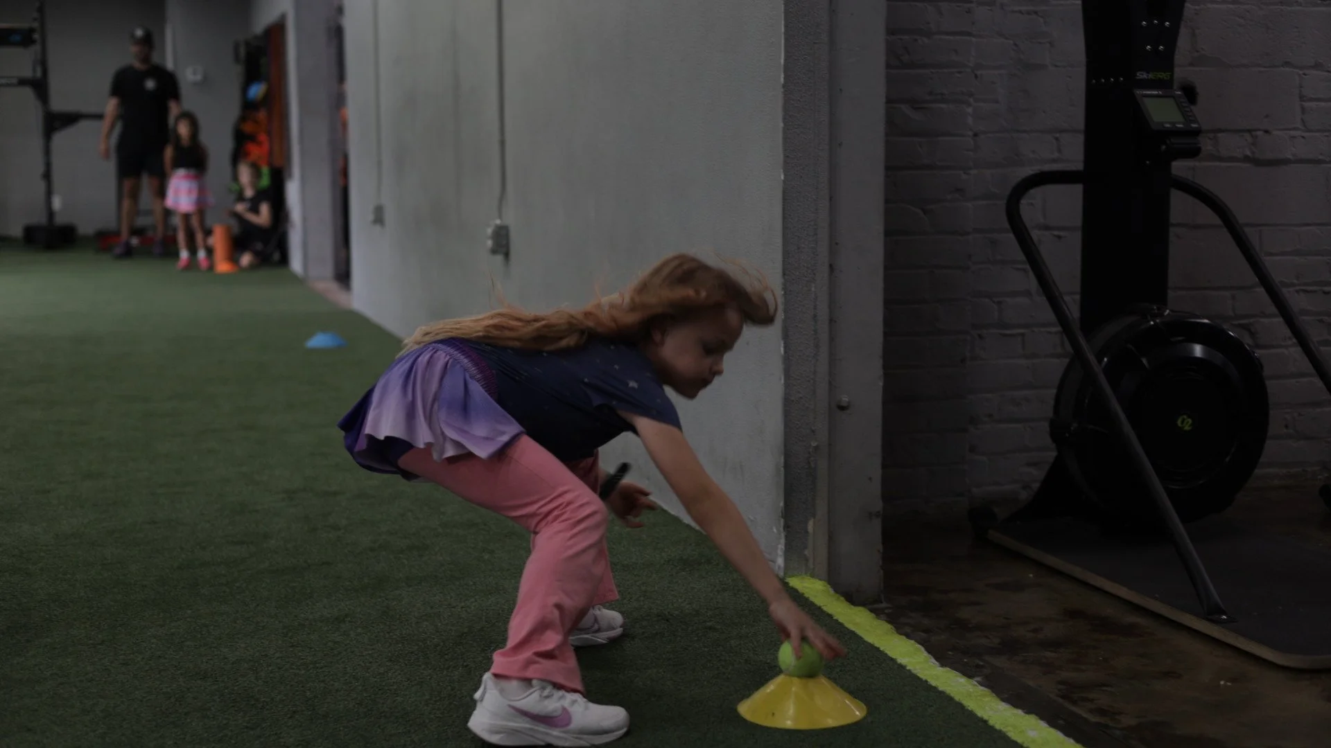 Young athlete performing reaction and change-of-direction drills during Perform24 Project Speed training in Tampa, Florida.