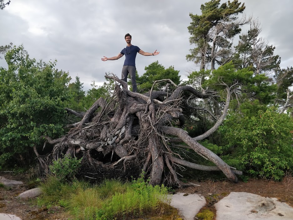 Josh summitting the highest peak on West Fox