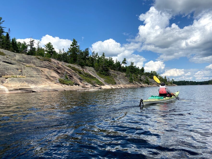 Canoe Channel cliffs falling into the French.