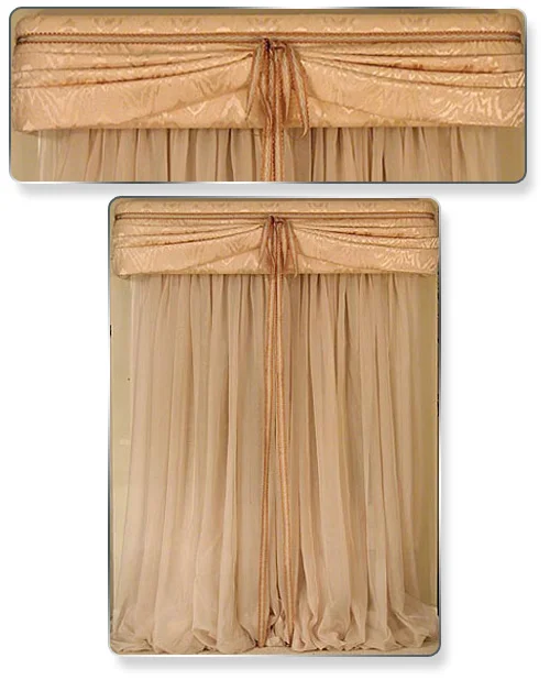 A rich looking upholstery material with double trim draped across the front.